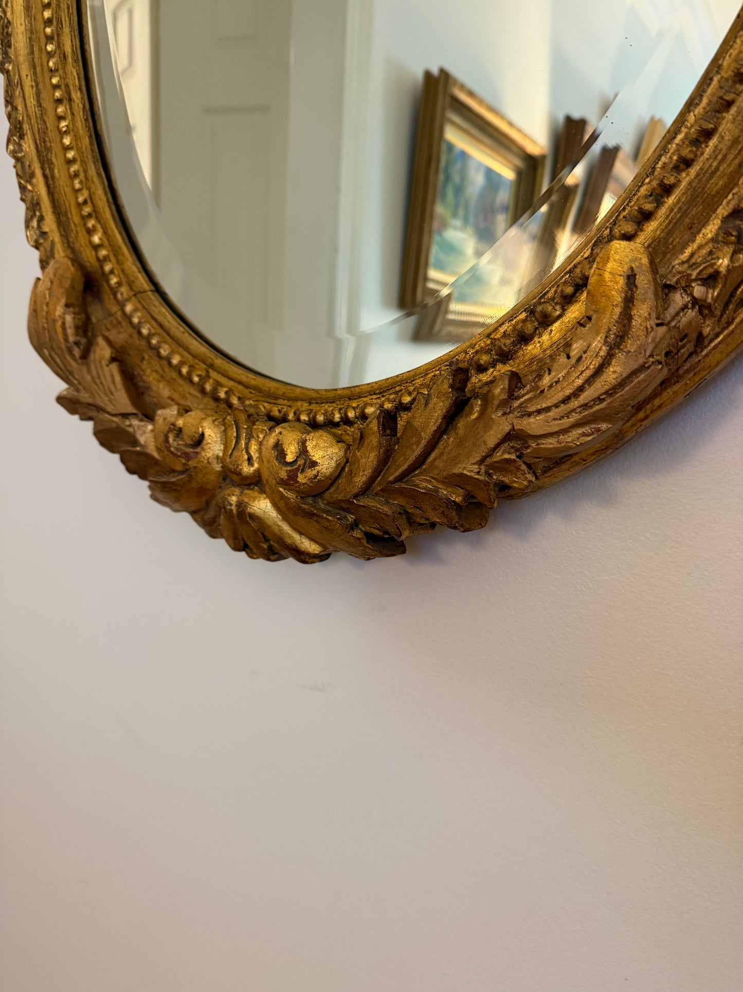 LOUIS XV STYLE GILT BEVELED OVAL MIRROR