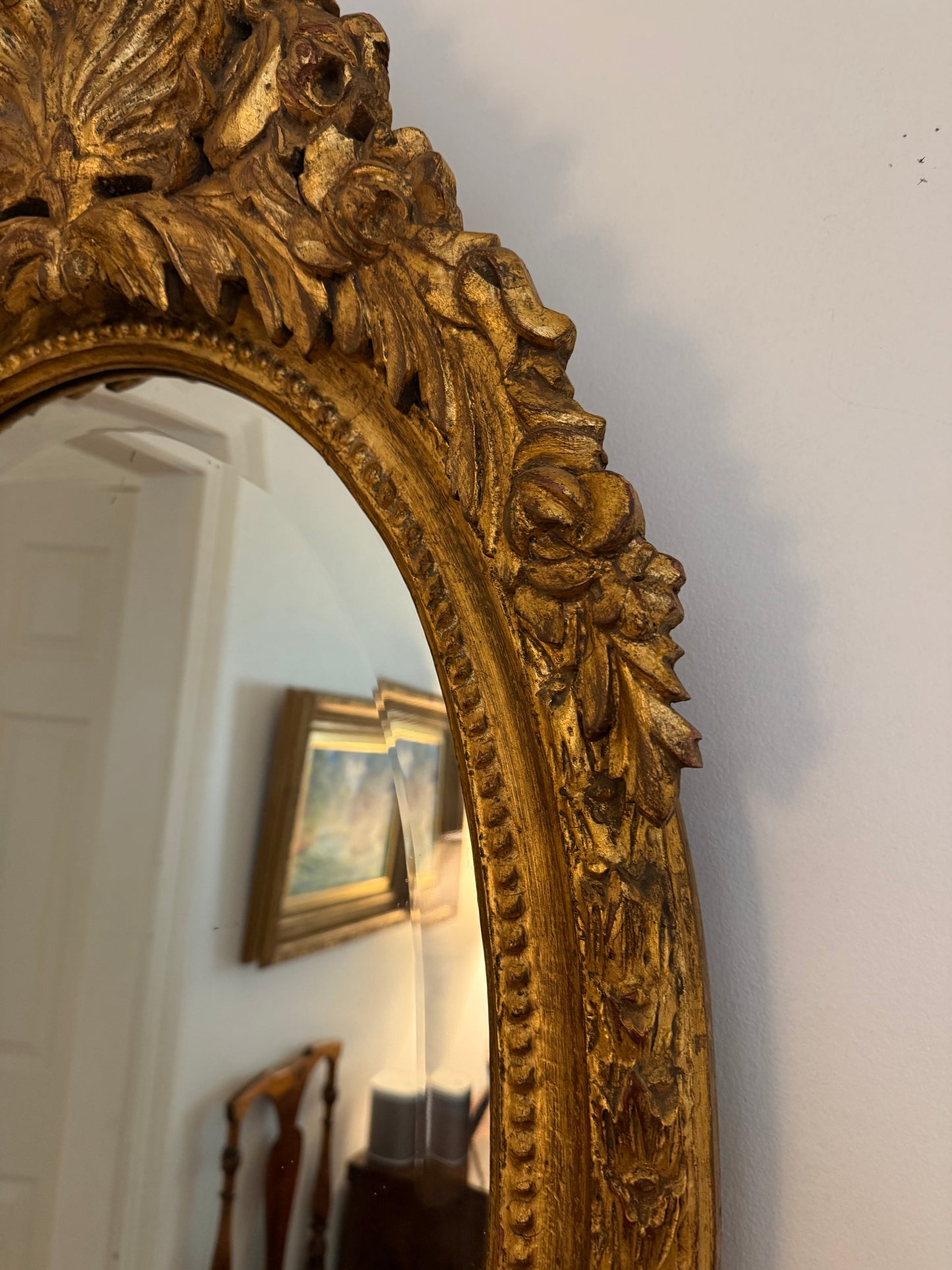 LOUIS XV STYLE GILT BEVELED OVAL MIRROR